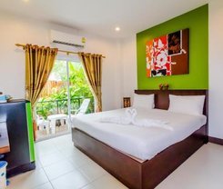 Baan Yuyen Karon Guesthouse. Location at 489 Patak Road, Karon, Muang,