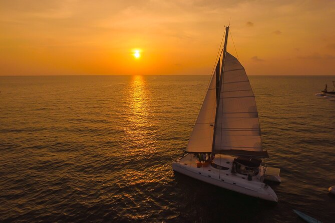 Coral Island Sunset Cruise by Catamaran Coral Island Sunset Cruise by Catamaran - Sunset Cruises